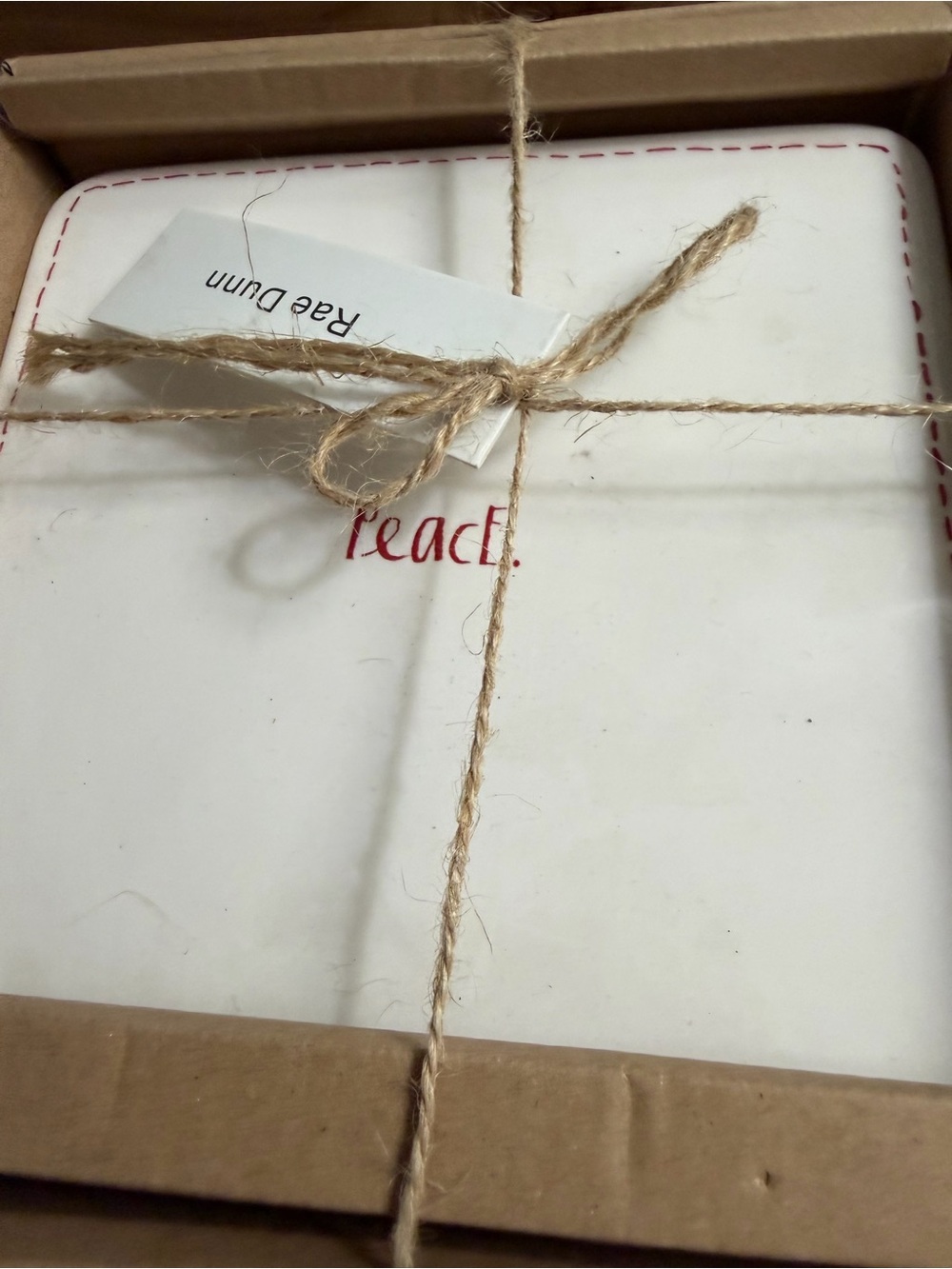 Rae Dunn White Ceramic Cheese Plate with “peace” and faux stitching and spreader